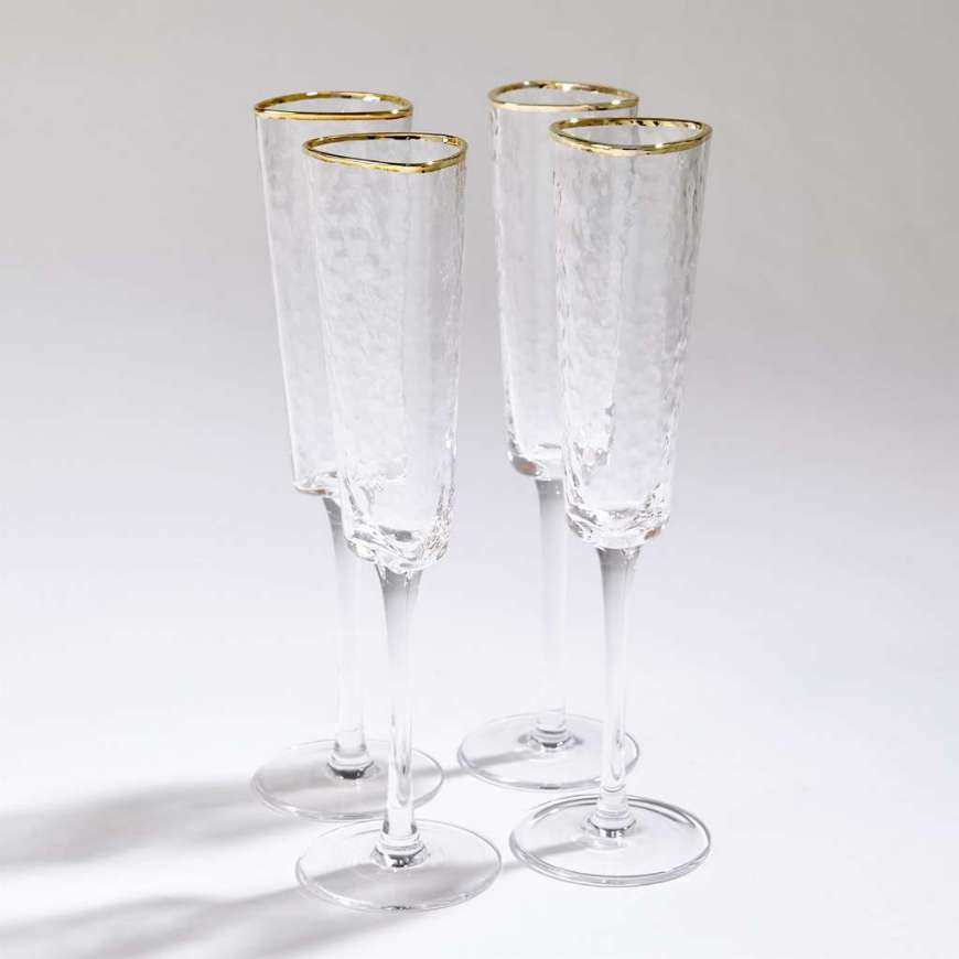 Picture of S/4 HAMMERED CHAMPAGNE GLASSES-CLEAR W/GOLD RIM