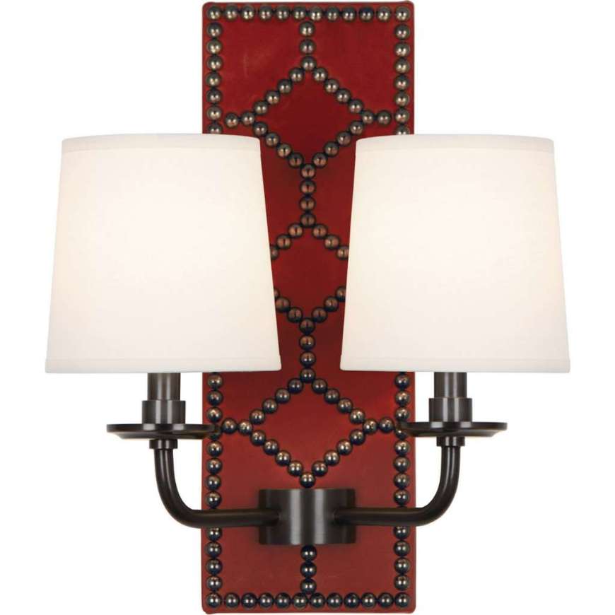 Picture of WILLIAMSBURG LIGHTFOOT WALL SCONCE IN BACKPLATE UPHOLSTERED IN DRAGONS BLOOD LEATHER WITH NAILHEAD DETAIL AND DEEP PATINA BRONZE ACCENTS Z1031